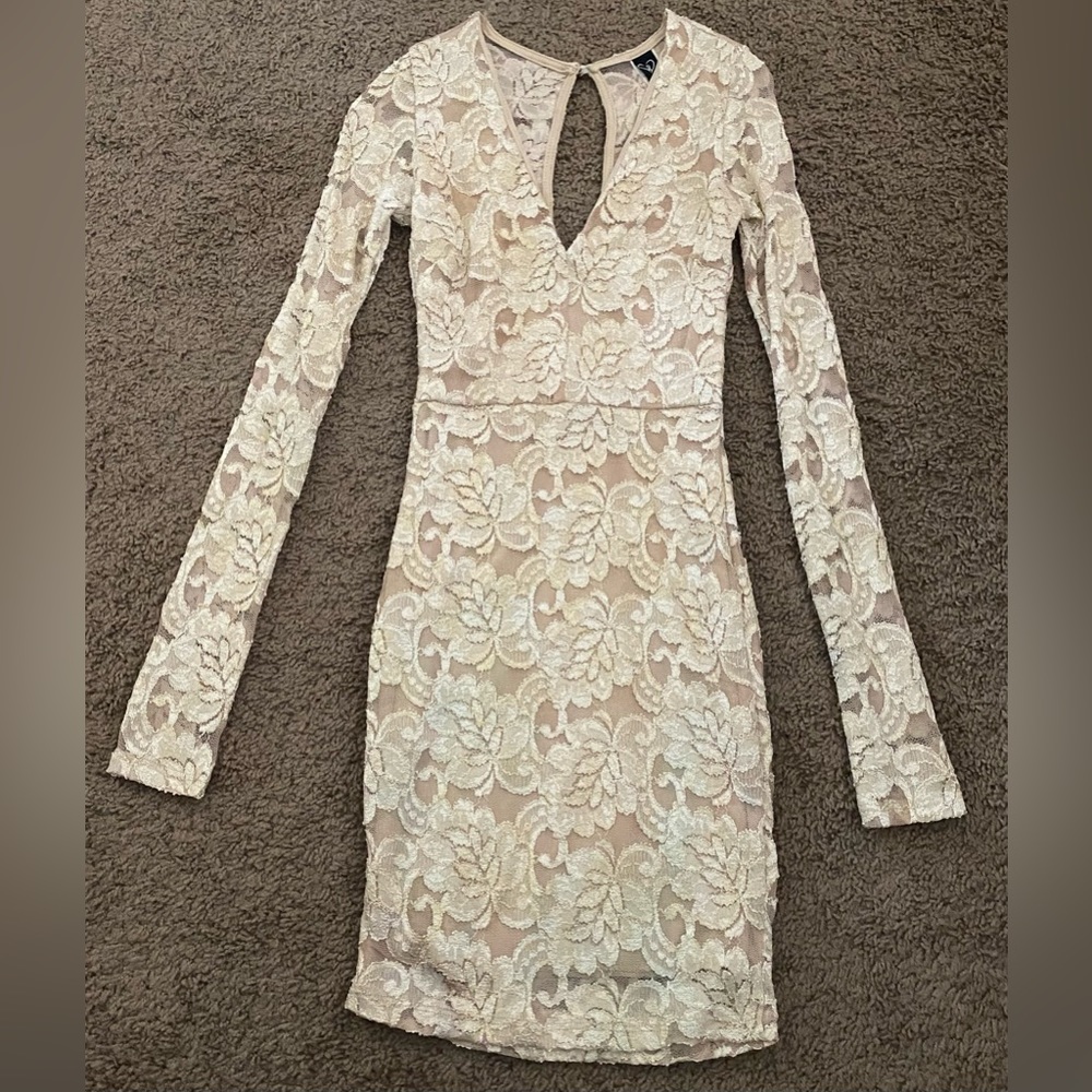 Long sleeve lace dress.